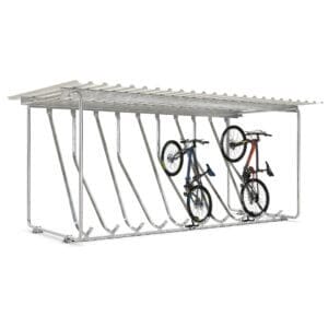 Velodome rijwieloverkapping met schuin geparkeerde fietsen, van verzinkt staal en met trapeziumdak
